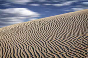 Windblown Clouds Over the Dunes